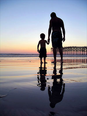 Padre en la playa